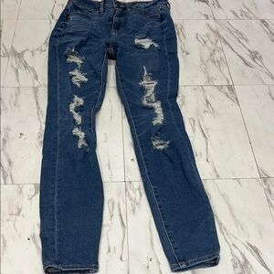 Women's Distressed Blue Jeans